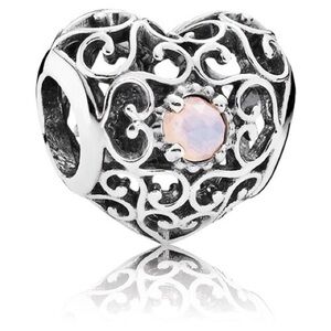 Authentic Retired Pandora Silver Heart with Opalescent Stone